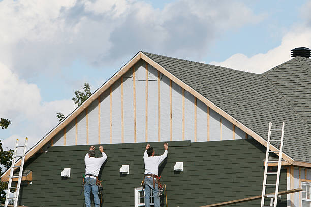 Professional Siding Installation technician working in Roanoke, IN